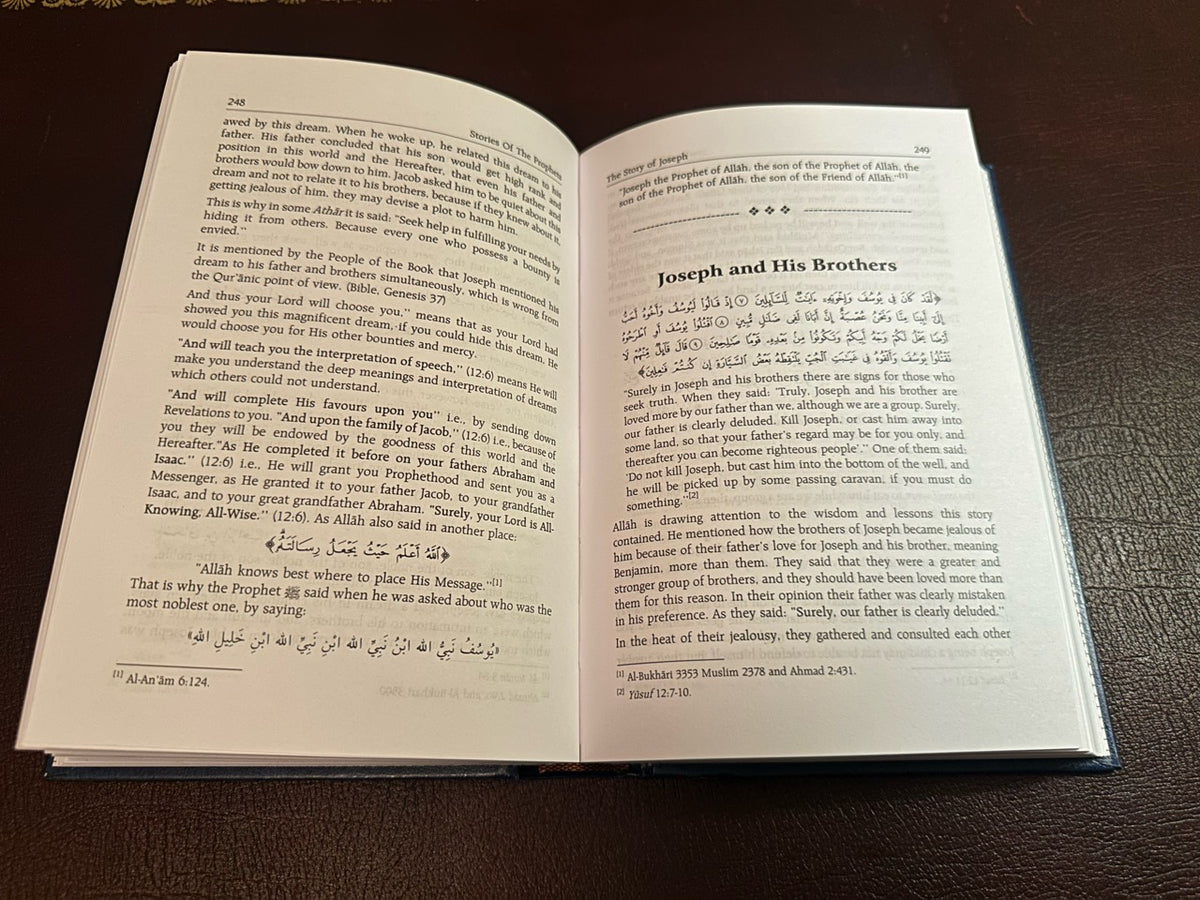 Open interior pages of the Darussalam Stories of the Prophets hardback, showing English text and Arabic quotations.