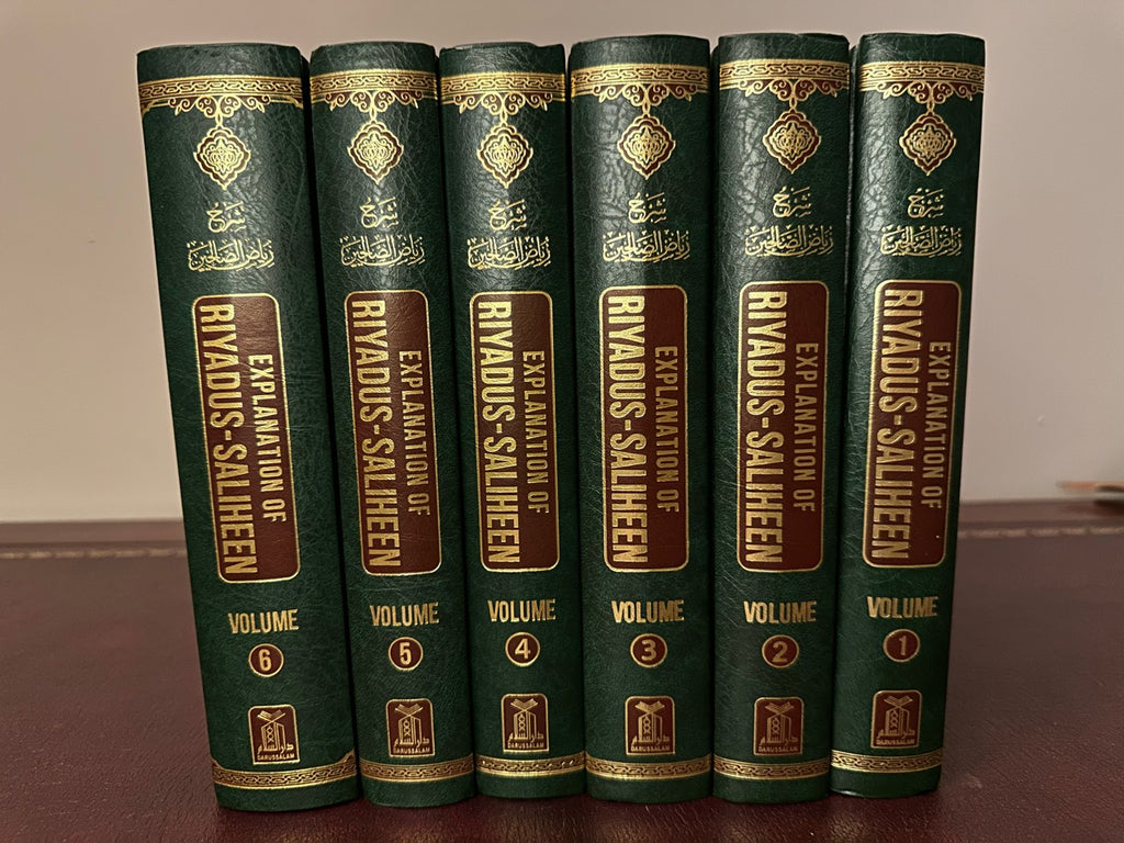 Spines of all six green-and-gold Darussalam Explanation of Riyad-us-Saliheen hardback volumes.